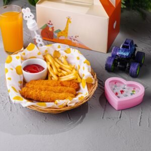 Kids meal with toy and juice on table